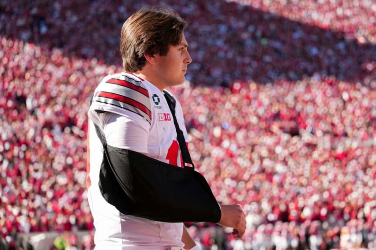 Ohio State Buckeyes quarterback Julian Sayin (10) returns to the field in a sling during the NCAA football game against the Indiana Hoosiers at Memorial Stadium Stadium in Bloomington, Ind. on Oct. 17, 2026.