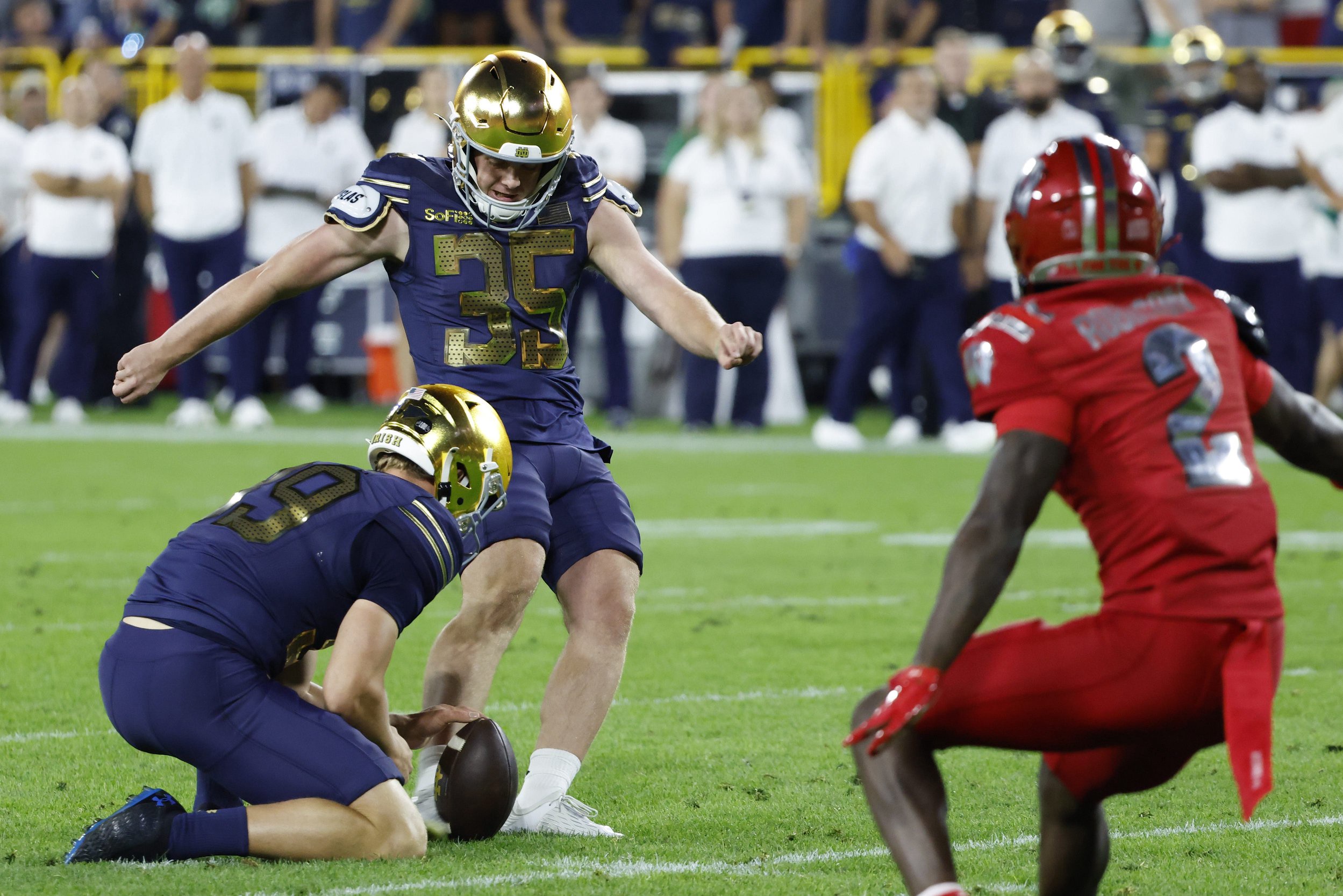 Sep 6, 2026; Green Bay, Wisconsin, USA;  Notre Dame Fighting Irish kicker Spencer Porath (35) kicks a field goal against the Wisconsin Badgers at Lambeau Field.  Mandatory Credit: Michael Caterina-Imagn Images