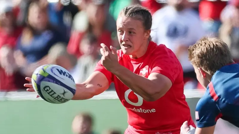 Lleucu George passing the ball for Wales