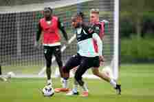 Christopher Nkunku and Jimi Tauriainen of Chelsea during a training session at Chelsea Training Ground on May 1, 2024