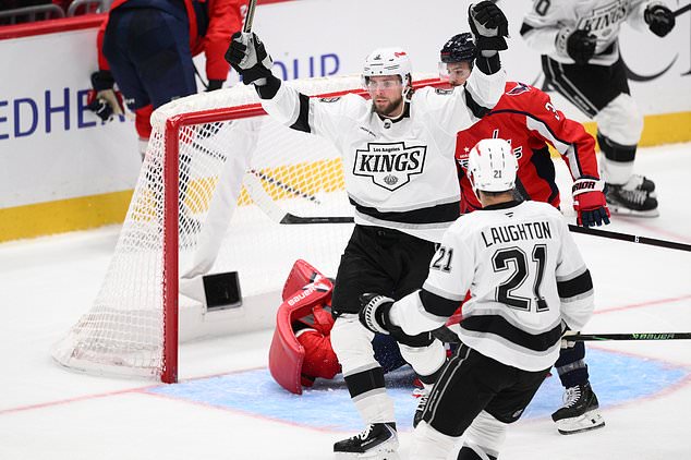 Los Angeles Kings right wing Adrian Kempe (9) celebrates his goal during the third period of an NHL hockey game against the Washington Capitals, Tuesday, Oct. 20, 2026, in Washington. (AP Photo/Nick Wass)