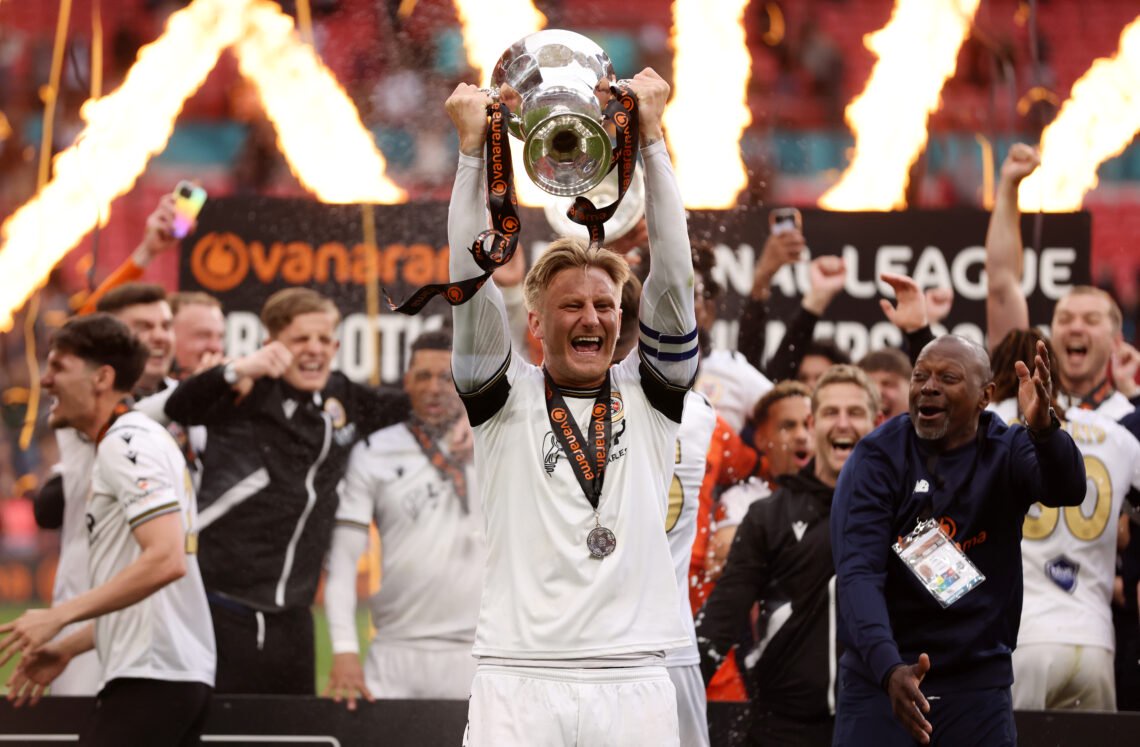 Byron Webster of Bromley celebrates with the trophy after winning the Vanarama National League Play-Off Final - Bromley v Solihull Moors - Vanarama National League Play-Off Final