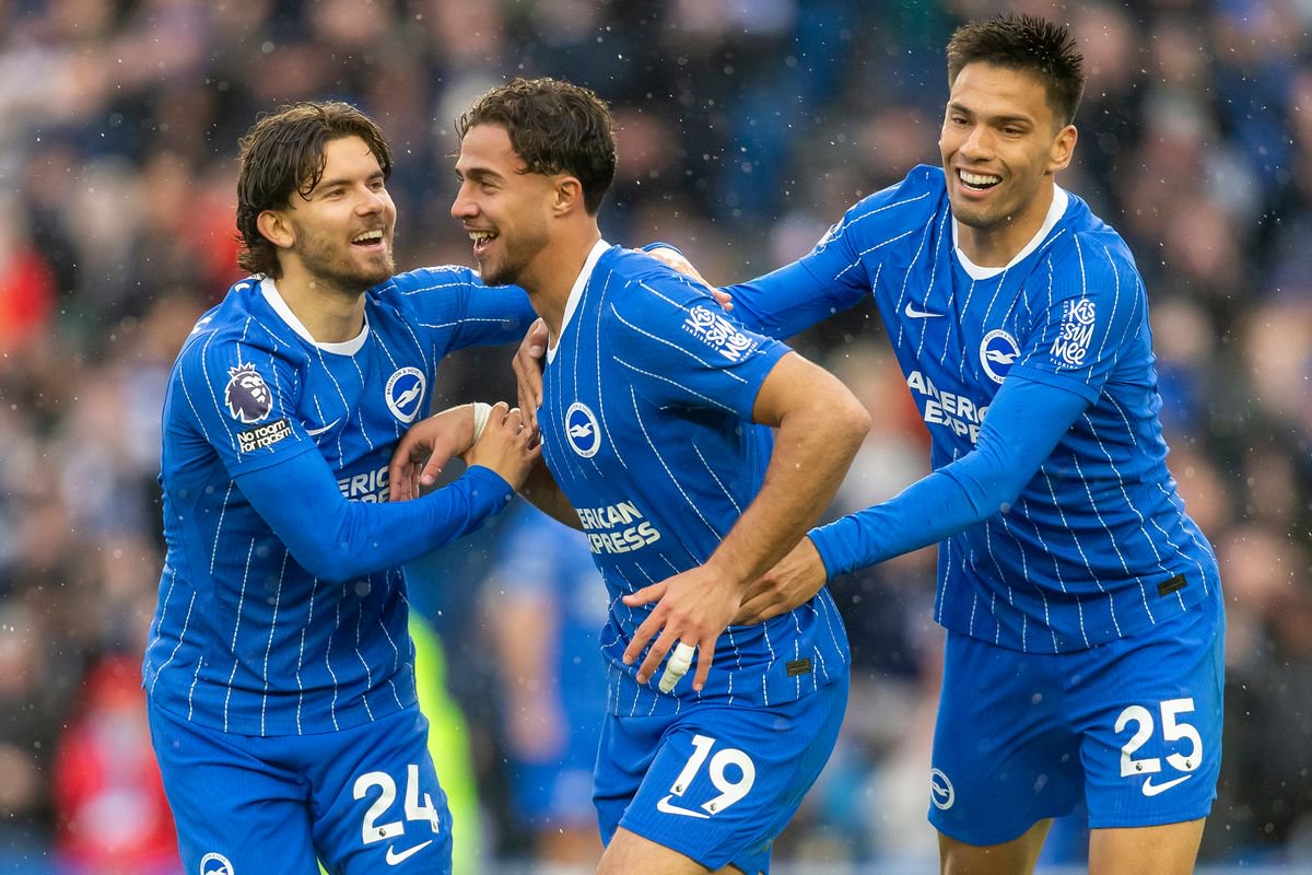 Charalampos Kostoulas celebrates with Brighton players