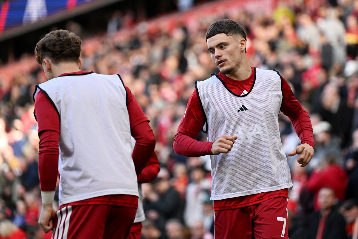 Florian Wirtz of Liverpool warms up before the Premier League match against Manchester City