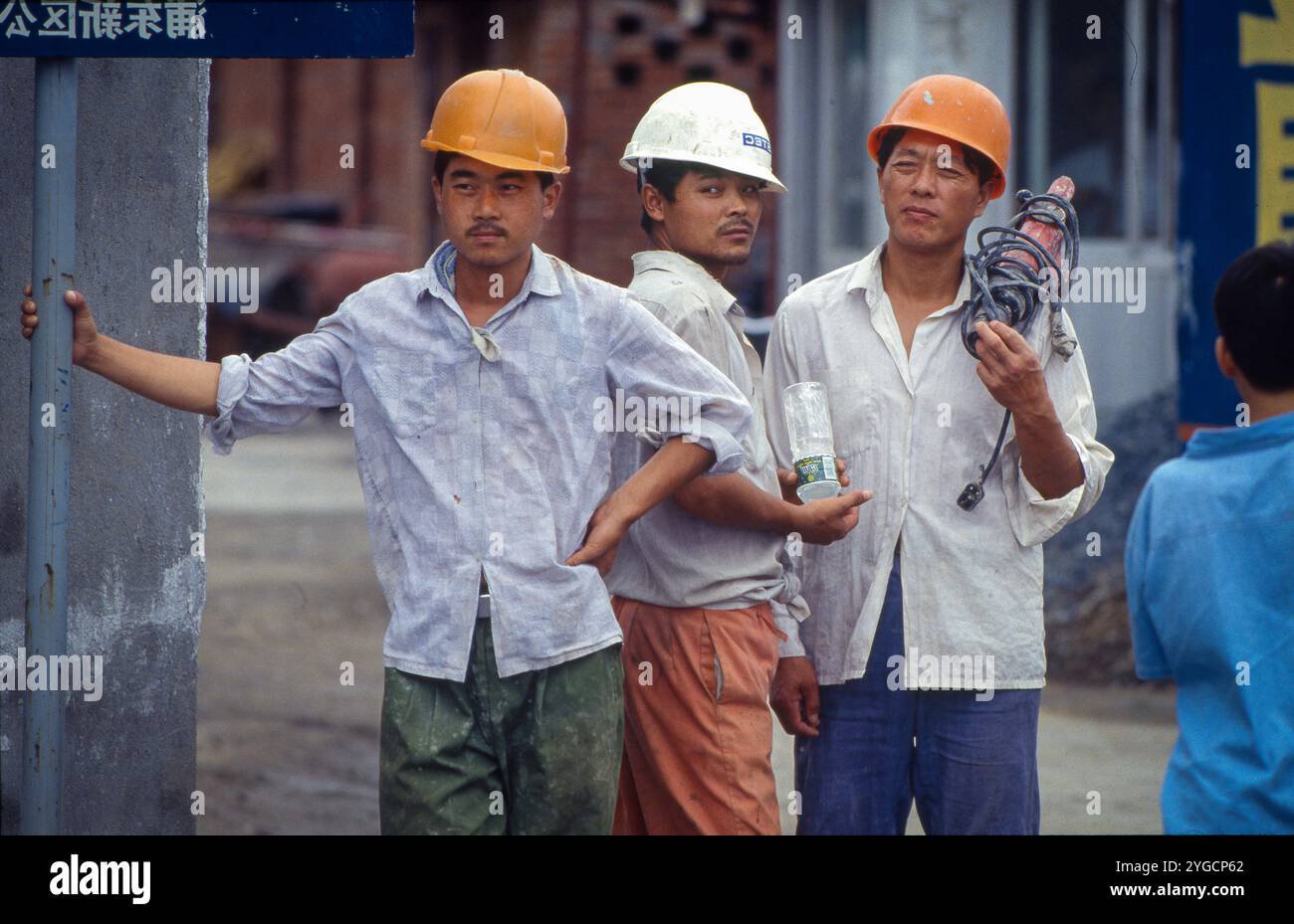 China beijing construction workers in front of a housing project