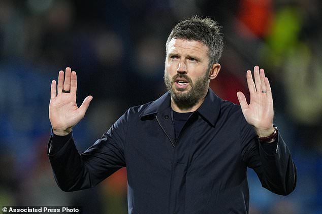 Manchester United's head coach Michael Carrick gestures as he leaves the pitch after the Champions League opening phase soccer match between Como and Manchester United in Como, Italy, Wednesday, Oct. 21, 2026. (AP Photo/Antonio Calanni)
