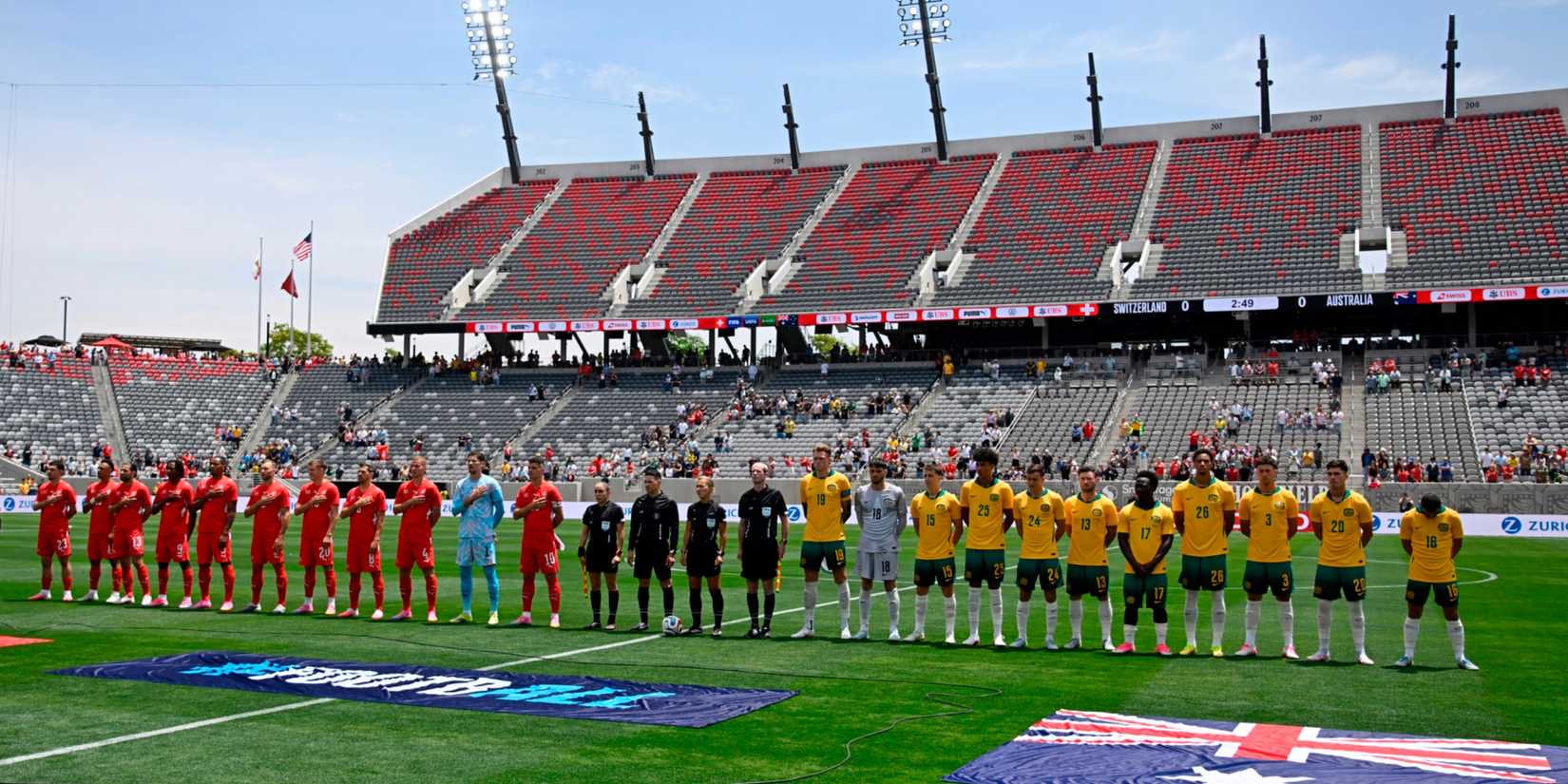 Switzerland and Australia players line up during the national anthems before the match at the Snapdragon Stadium