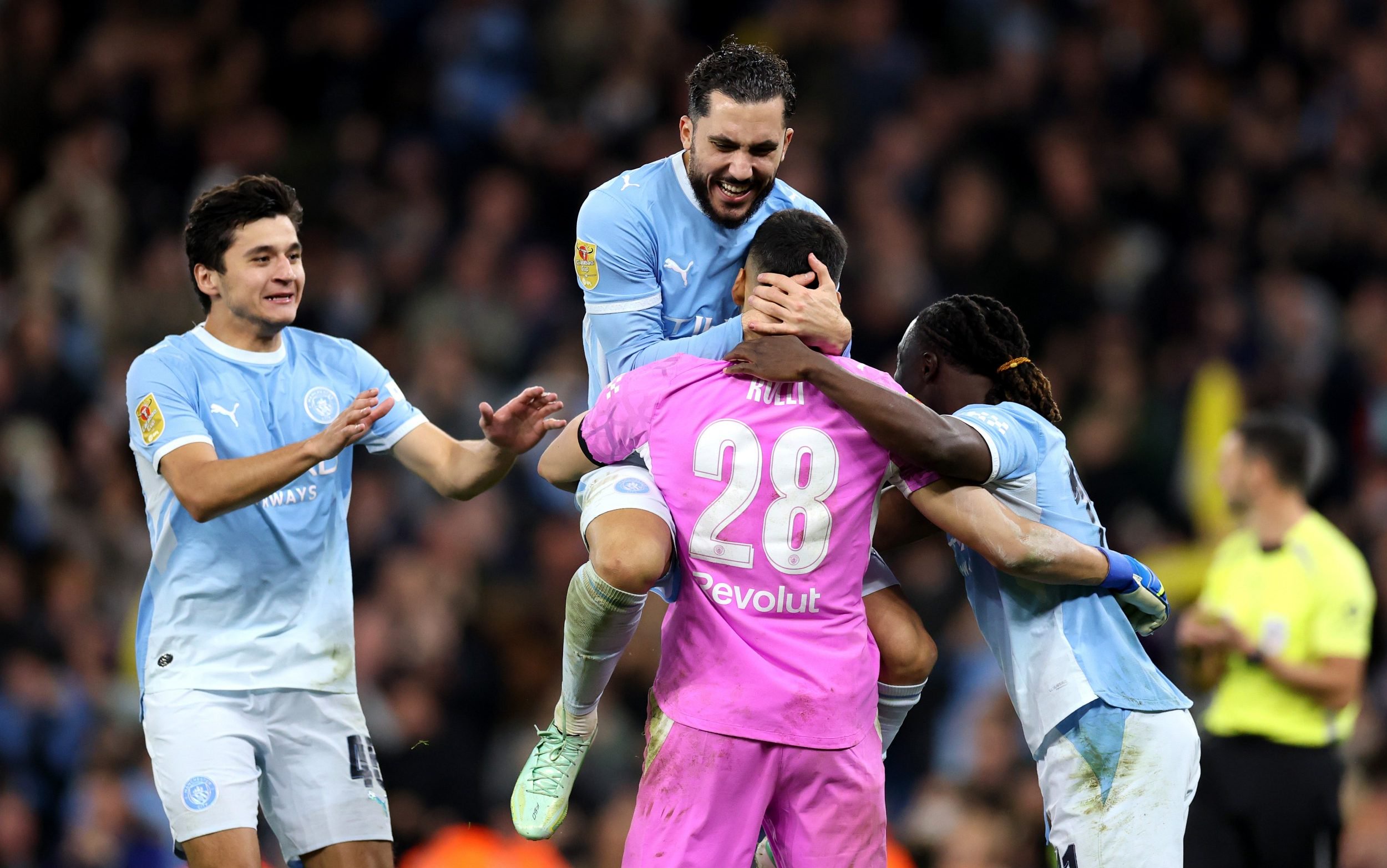Manchester City celebrate their League Cup penalty shoot-out victory over Brighton