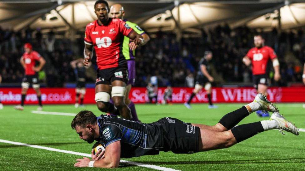 Warriors' Ollie Smith scores the match winning try for Glasgow Warriors during a BKT United Rugby Championship match between Glasgow Warriors and 10bet Lions at Scotstoun Stadium, on October 30, 2026, in Glasgow