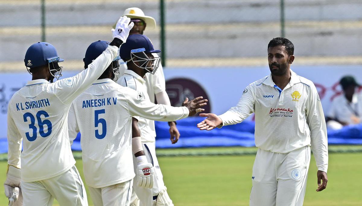 Karnataka's Shreyas Gopal celebrates after taking the wicket of Tripura's Hrituraj Ghosh Roy on day three of their Ranji Trophy match at the Srikantadatta Narasimha Raja Wadiyar ground (Gangotri Glades), Mysuru, on October 28, 2026.&nbsp;