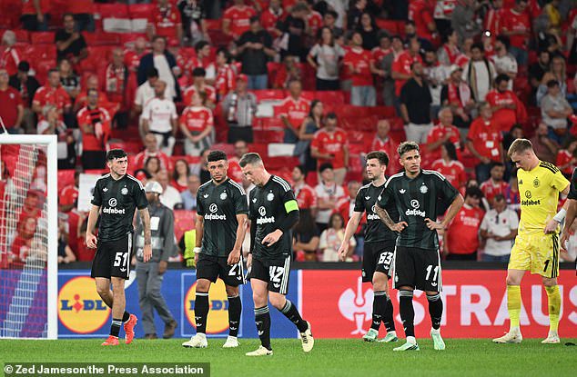 The Celtic players look dejected after the final whistle sounds in Lisbon on Thursday