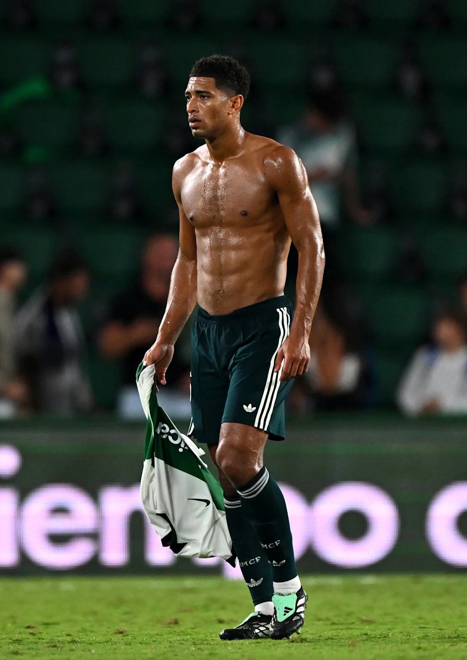 Jude Bellingham goes shirtless at a soccer match