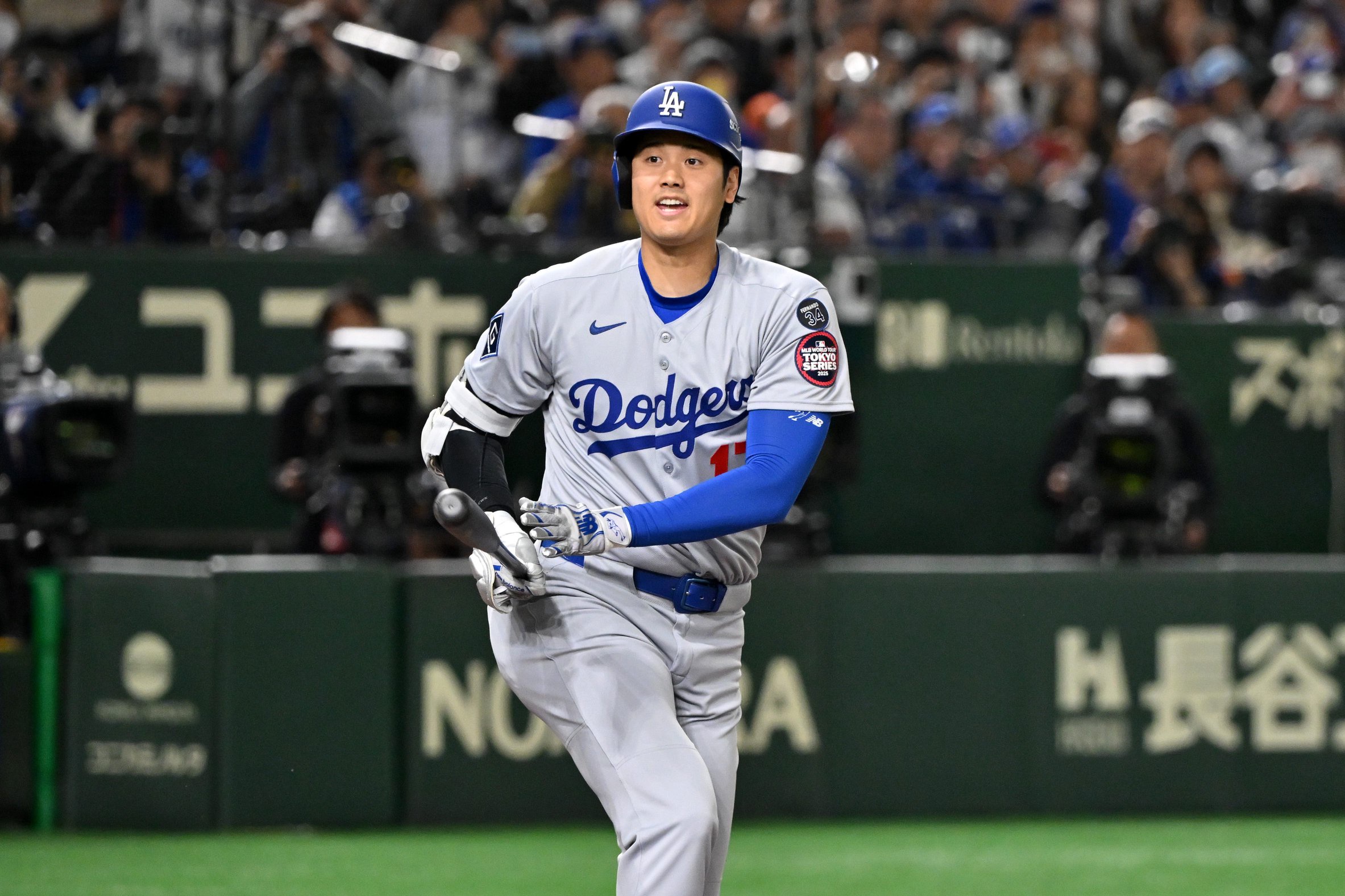 Shohei Ohtani #17 of the Los Angeles Dodgers reacts at bat in the top of the third inning during the MLB Tokyo Series game against Chicago Cubs at Tokyo Dome on March 18, 2025 in Tokyo, Japan.