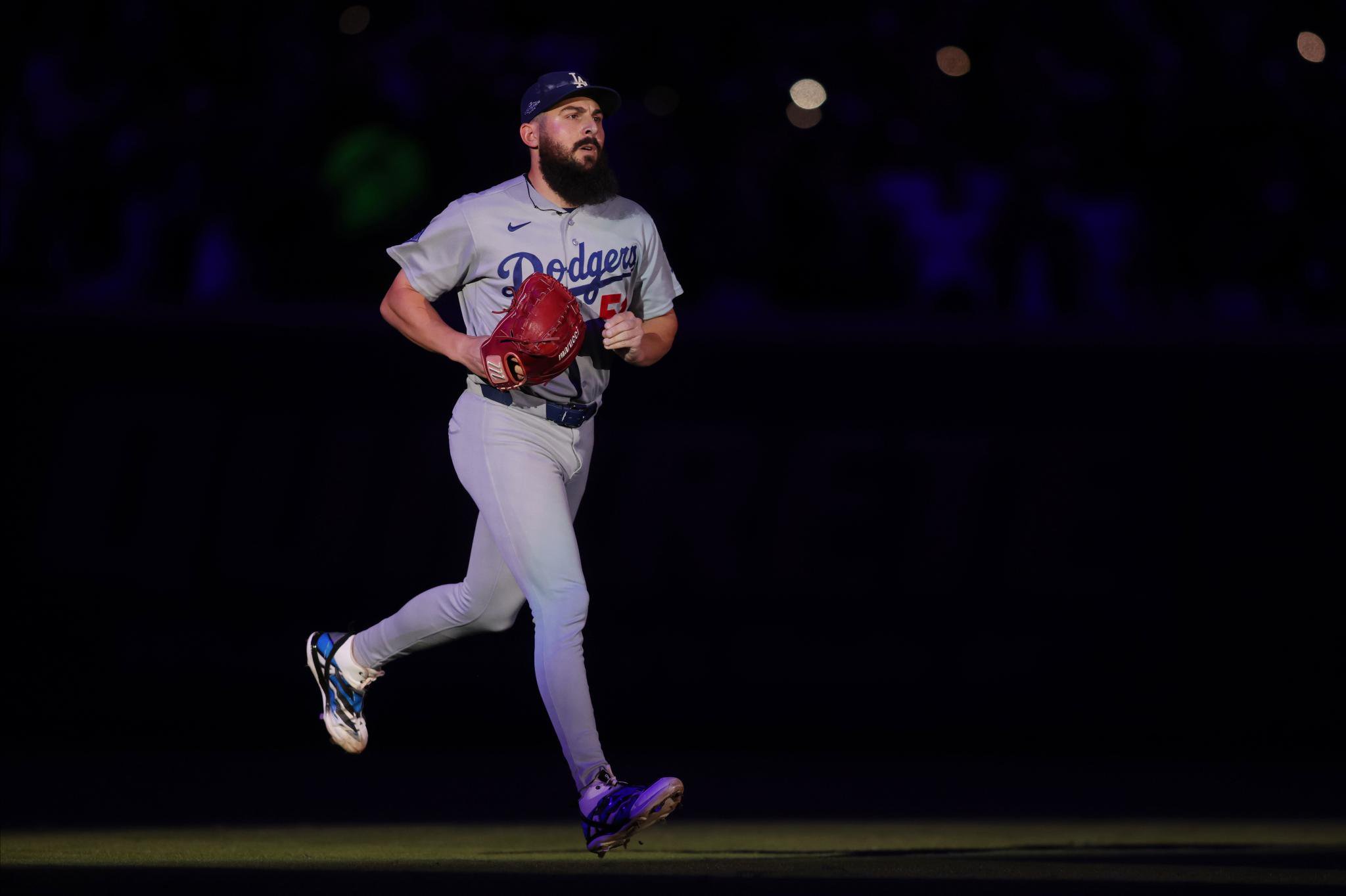 Los Angeles Dodgers pitcher Alex Vesia runs to the mound during the fifth inning against the Atlanta Braves.