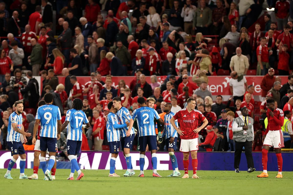 Coventry City players celebrate a goal against Nottingham Forest