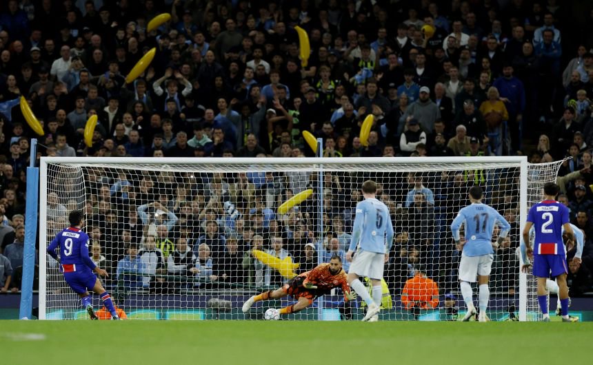 Paris St Germain's Ferran Torres misses from the penalty spot, after a save by Manchester City's Gianluigi Donnarumma in Manchester, Britain, on Wednesday, October 14.