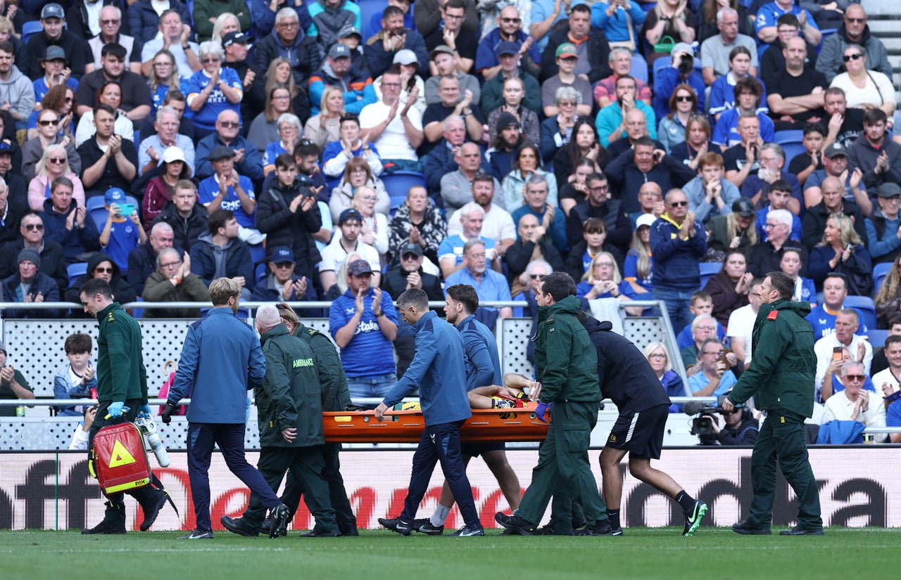 Martinez was stretchered off the pitch following around 10 minutes of treatment (Getty)
