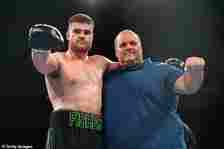 Fisher's dad (right) has become a social media sensation, but the heavyweight prospect says his father knows not to get involved when he steps between the ropes
