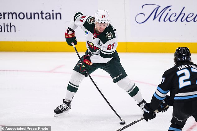 Minnesota Wild left wing Kirill Kaprizov (97) looks to pass during the first period of an NHL hockey game against the Utah Mammoth, Tuesday, Oct. 27, 2026, in Salt Lake City. (AP Photo/Tyler Tate)