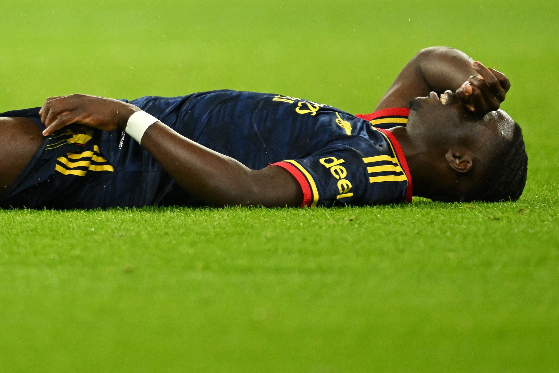 Saka pulled up in pain immediately after making the pass