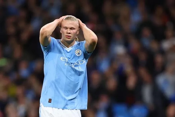 Erling Haaland of Manchester City reacts after missing a chance during the UEFA Champions League match between Manchester City and FK Crvena Zvezda at Etihad Stadium on September 19, 2023 in Manchester, England.