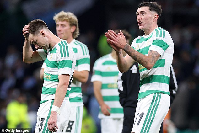 Kieran Tierney holds his head in his hand as Celtic's players reflect on another European failure
