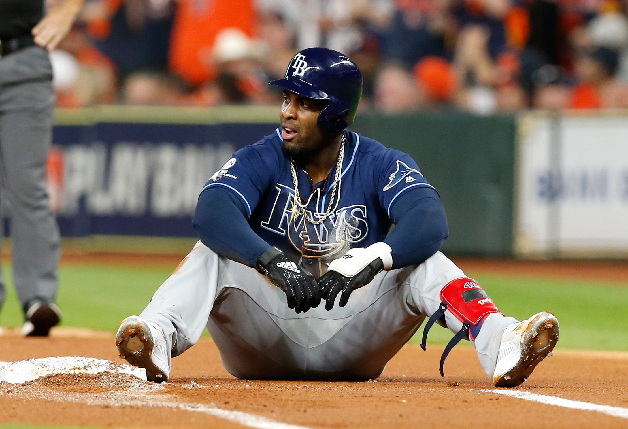Yandy Díaz #2 of the Tampa Bay Rays reacts after getting out at first base during the first inning of Game 2 of the ALDS against the Houston Astros at Minute Maid Park on October 05, 2019 in Houston, Texas.