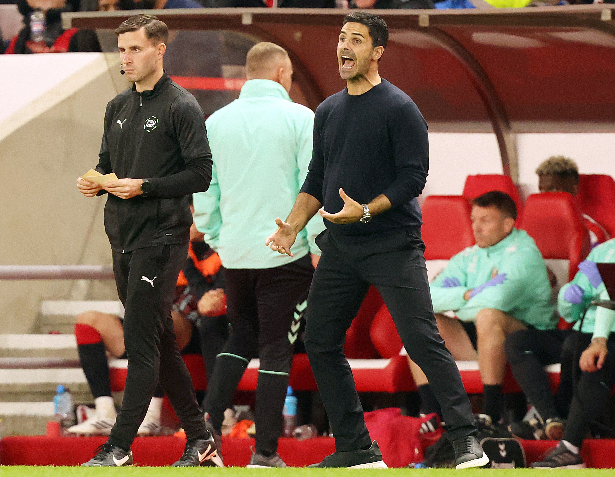 Mikel Arteta watches Arsenal against Nottingham Forest in the Premier League from the technical area