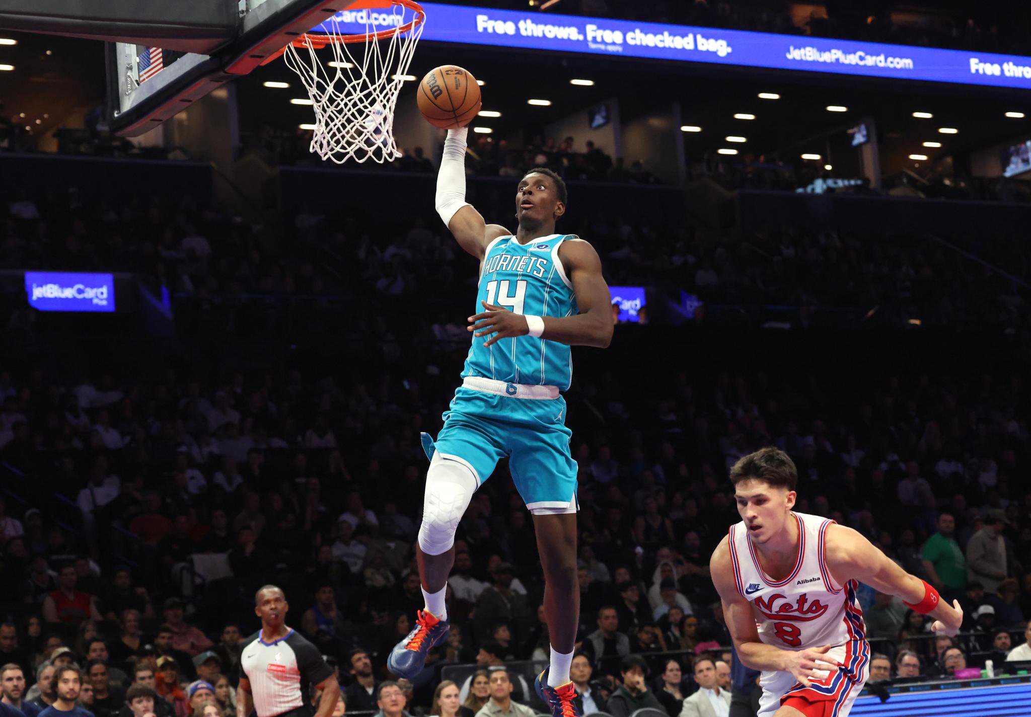 Moussa Diabate rises up for a dunk during the Nets' season-opening loss to the Hornets on Oct. 21, 2026 at Barclays Center.