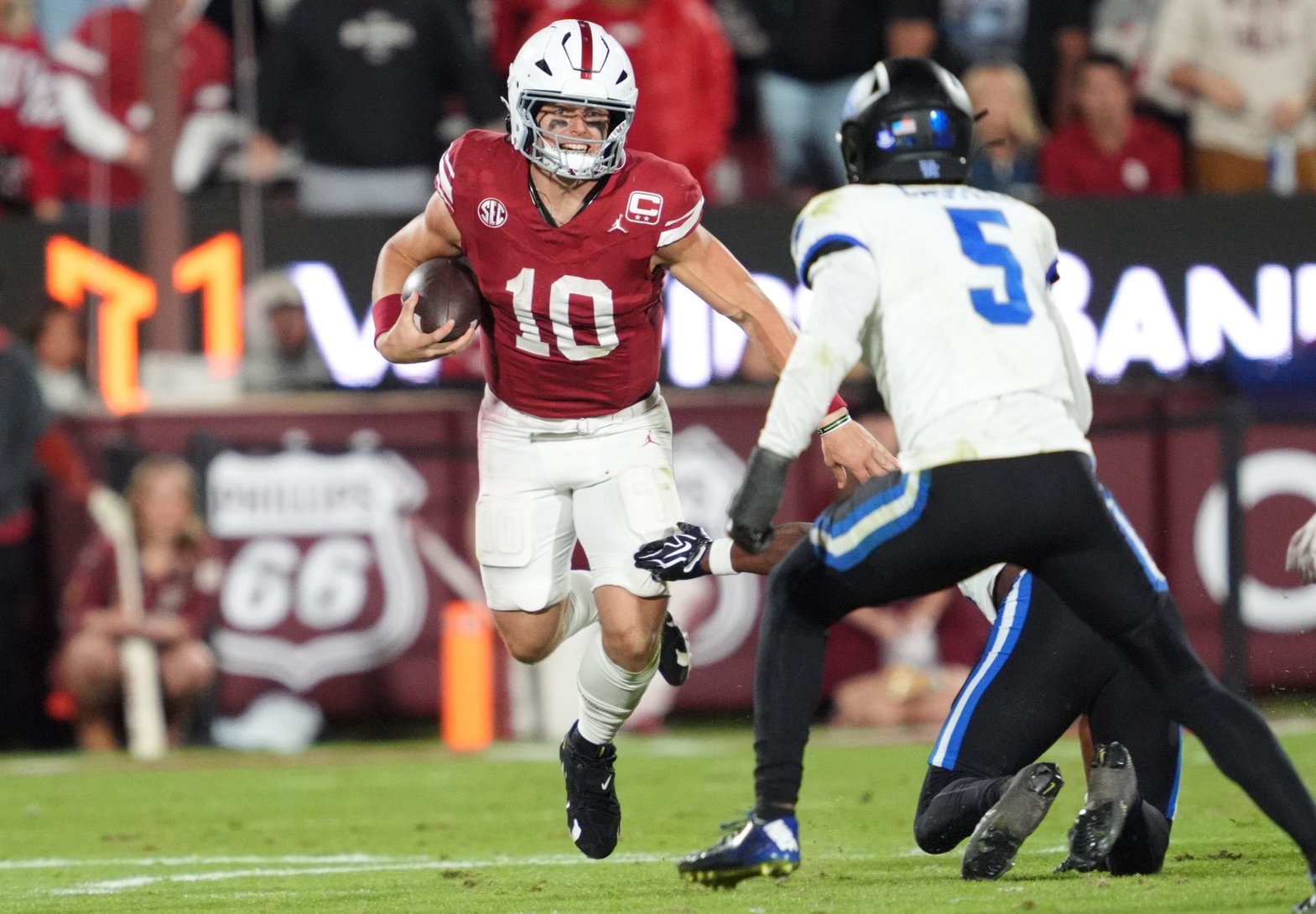 Oklahoma's John Mateer (10) scrambles in the fourth quarter of the college football game between the University of Oklahoma Sooners (OU) and the Kentucky Wildcats at Gaylord Family — Oklahoma Memorial Stadium in Norman, Okla.,  Saturday, Oct., 17, 2026.