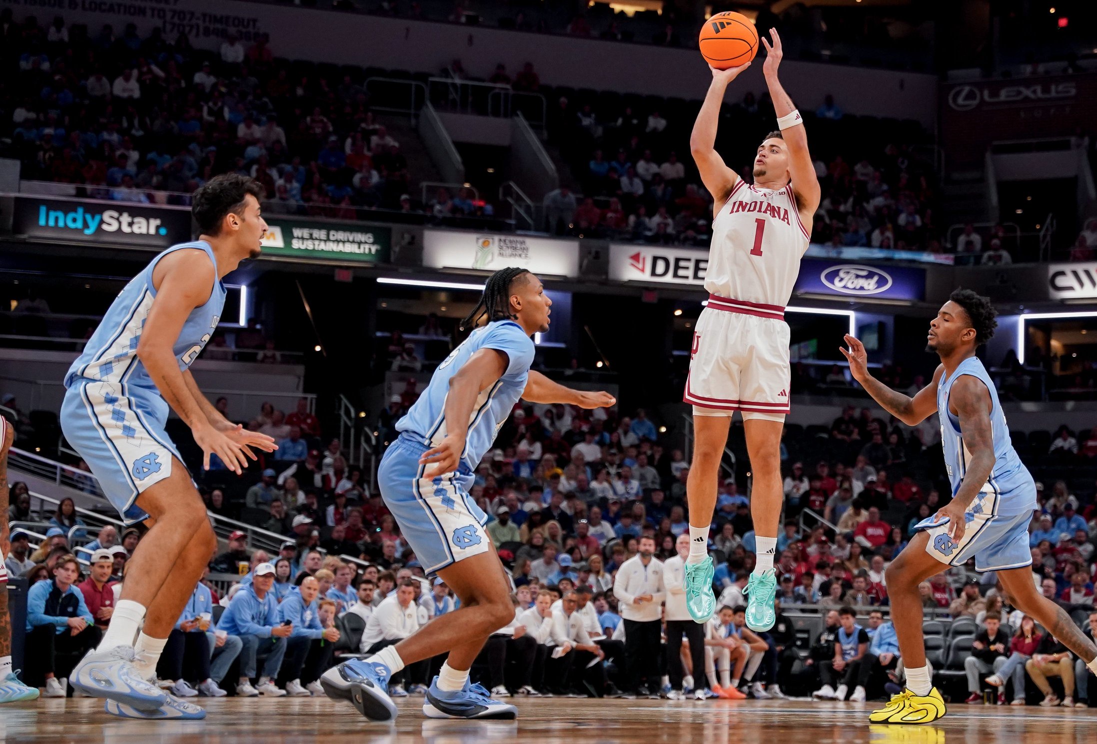 Oct 18, 2026; Indianapolis, IN, USA; Indiana Hoosiers guard Darren Harris (1) shoots the ball against against the North Carolina Tar Heels during the first half at Gainbridge Fieldhouse. Mandatory Credit: Robert Goddin-Imagn Images