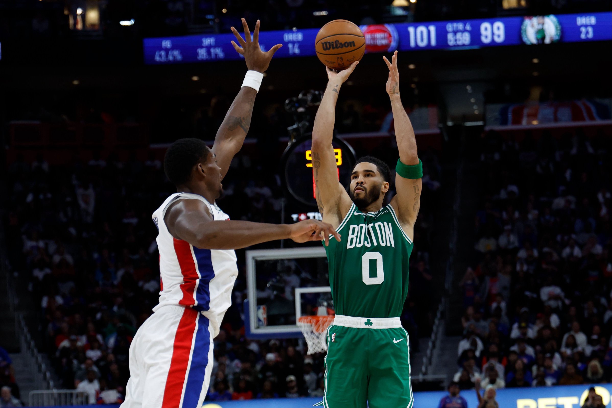 Oct 20, 2026; Detroit, Michigan, USA;  Boston Celtics forward-guard Jayson Tatum (0) shoots on Detroit Pistons center Jalen Duren (0) in the second half at Little Caesars Arena.  Mandatory Credit: Rick Osentoski-Imagn Images