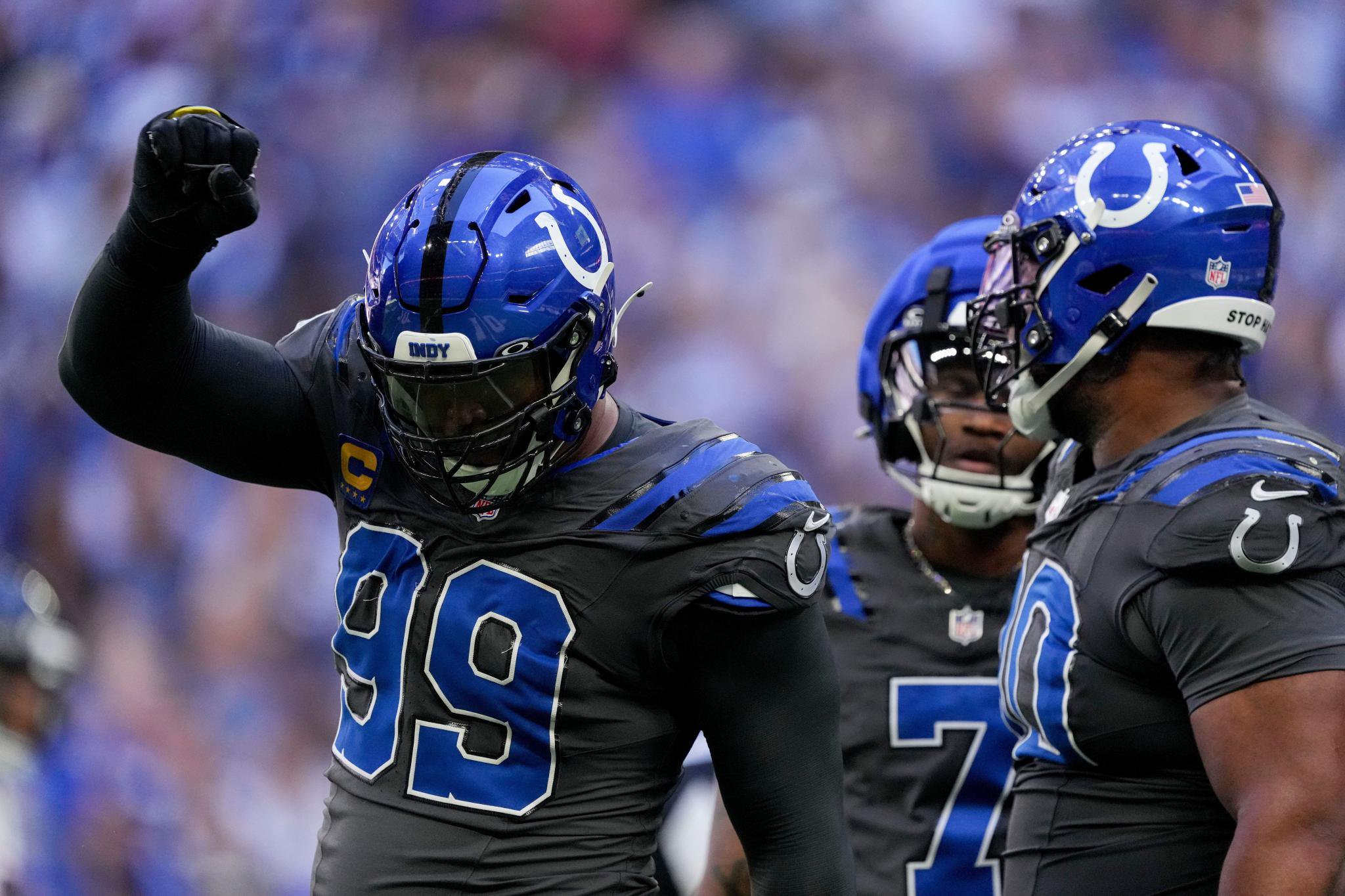Indianapolis Colts defensive tackle DeForest Buckner (99) celebrates a tackle during a game.