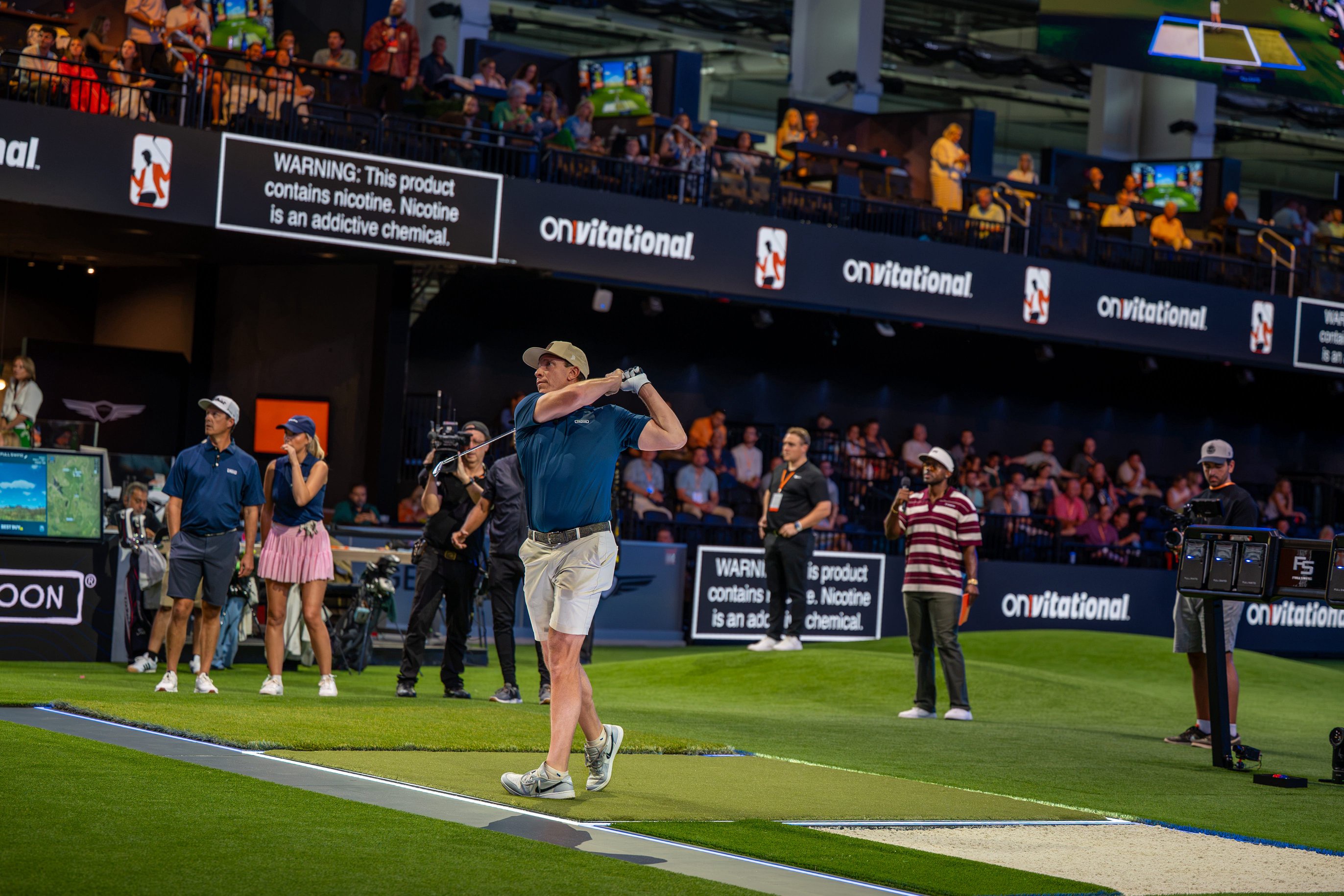 Ricky Barnes swings inside TGL's SoFi Center in Palm Beach Garden, Florida, during the inaugural on!vitational, an event mixing competition and entertainment. 