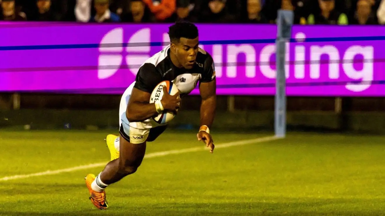 Immanuel Feyi-Waboso diving over for a try at the Rec in 2026/27