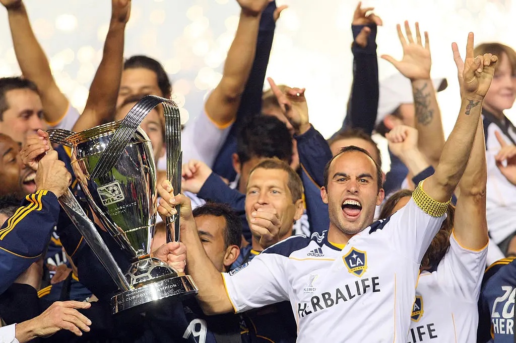 donovan hoisting mls cup trophy