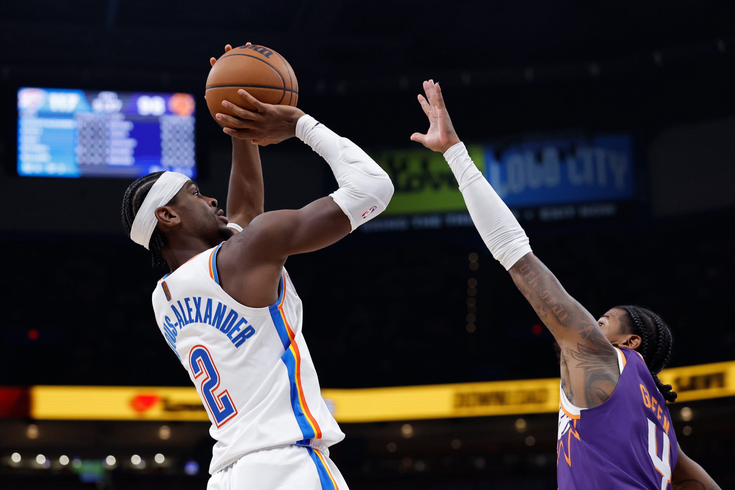 Oct 26, 2026; Oklahoma City, Oklahoma, USA; Oklahoma City Thunder guard Shai Gilgeous-Alexander (2) shoots over Phoenix Suns guard Jalen Green (4) during the second half at Paycom Center. Mandatory Credit: Alonzo Adams-Imagn Images