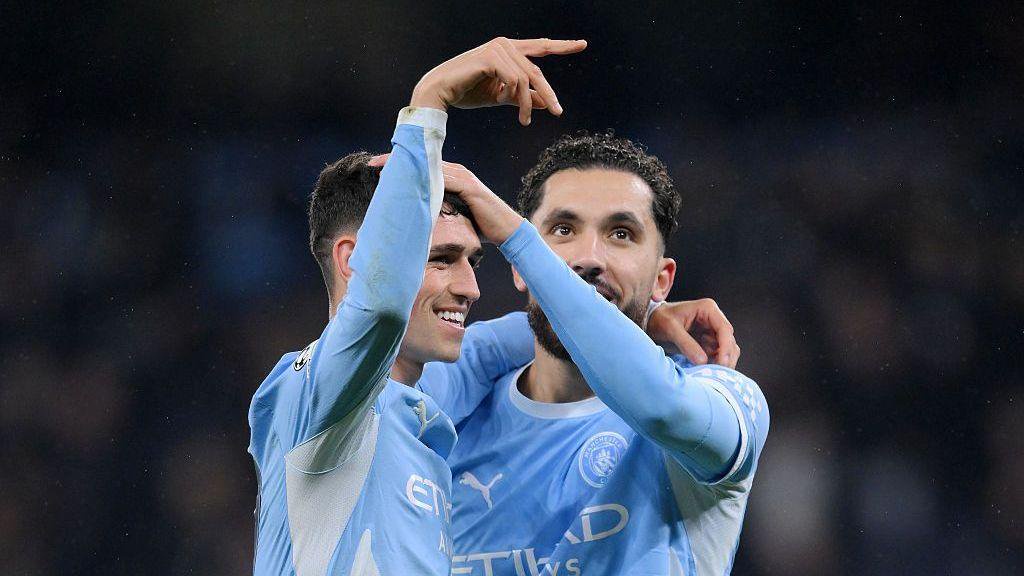 Phil Foden and Rayan Cherki of Manchester City celebrate