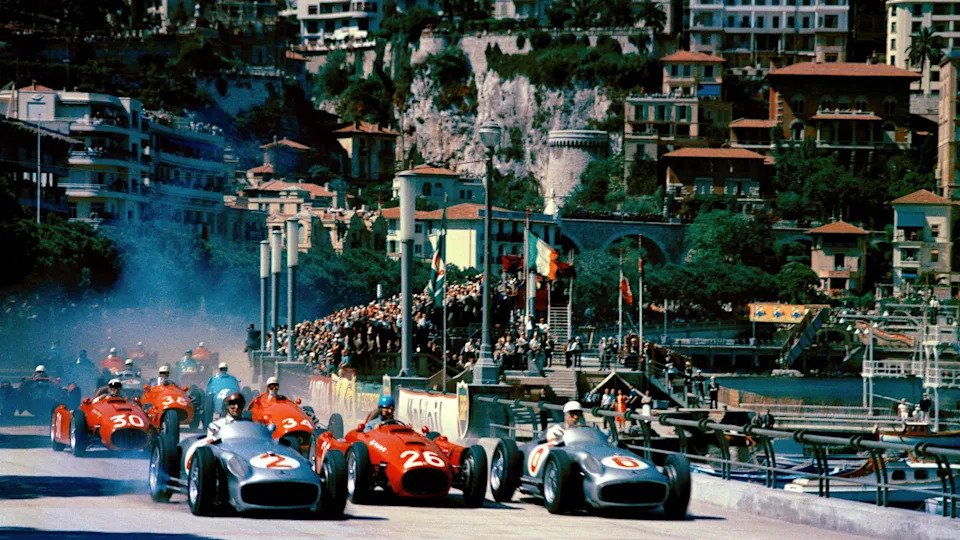 The start of the 1955 race with the Mercedes of Juan Manuel Fangio and Stirling Moss leading the way