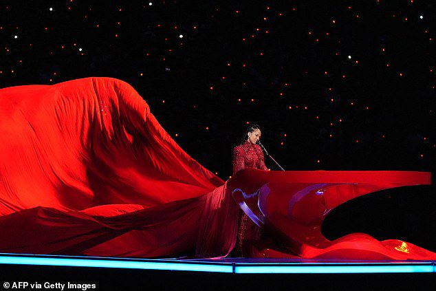 He also complimented his wife, who he called 'my love' in his post, and her stunning red dress