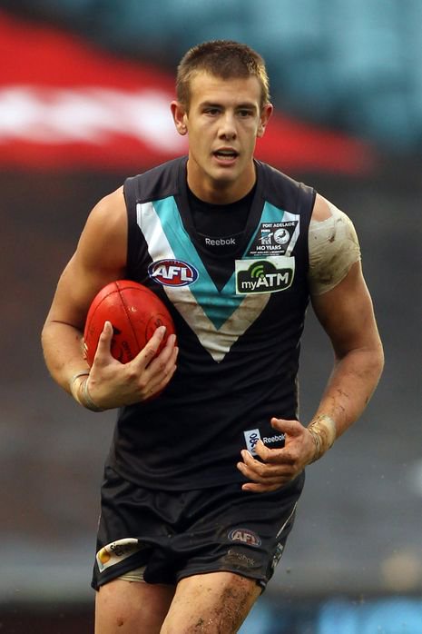 ADELAIDE, AUSTRALIA - MAY 29:  Daniel Stewart of the Power runs with the ball during the round 10 AFL match between Port Adelaide Power and the Richmond Tigers at AAMI Stadium on May 29, 2010 in Adelaide, Australia. (Photo by Morne de Klerk/Getty Images)