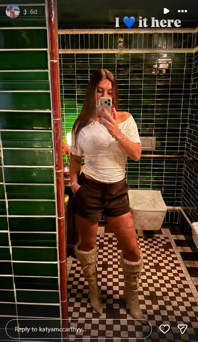 Katya posted this photo of herself from what appears to be an upscale Manhattan restaurant