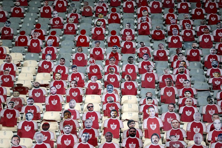 Cardboard cut-outs of fans were placed on seats around the stadium