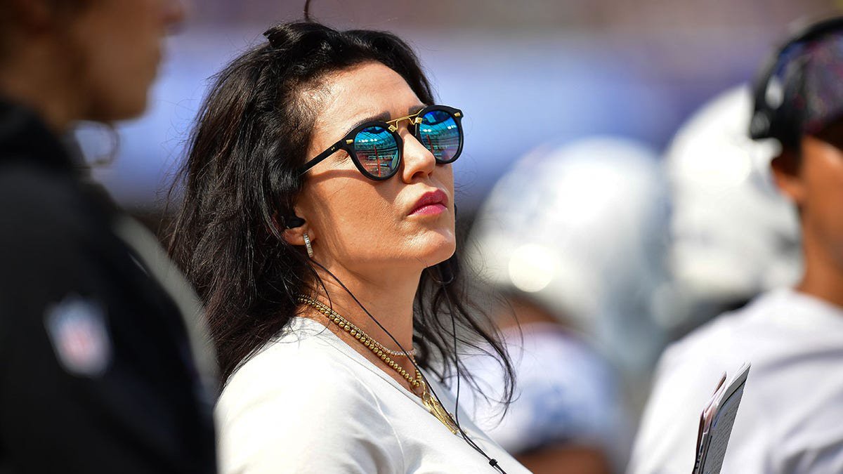 Carlie Irsay-Gordon on the sideline of a Colts-Rams game