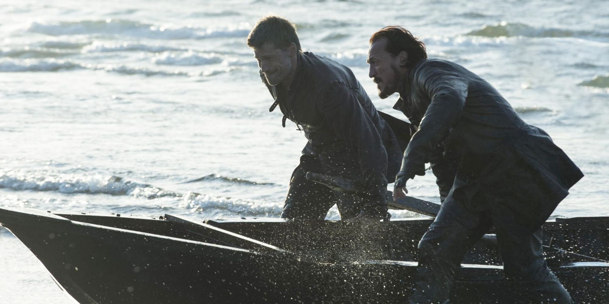 Jaime and Bronn push a small boat to shore in Game of Thrones.