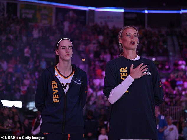 Other teams, including the Indiana Fever, remain on the court for the anthem before games