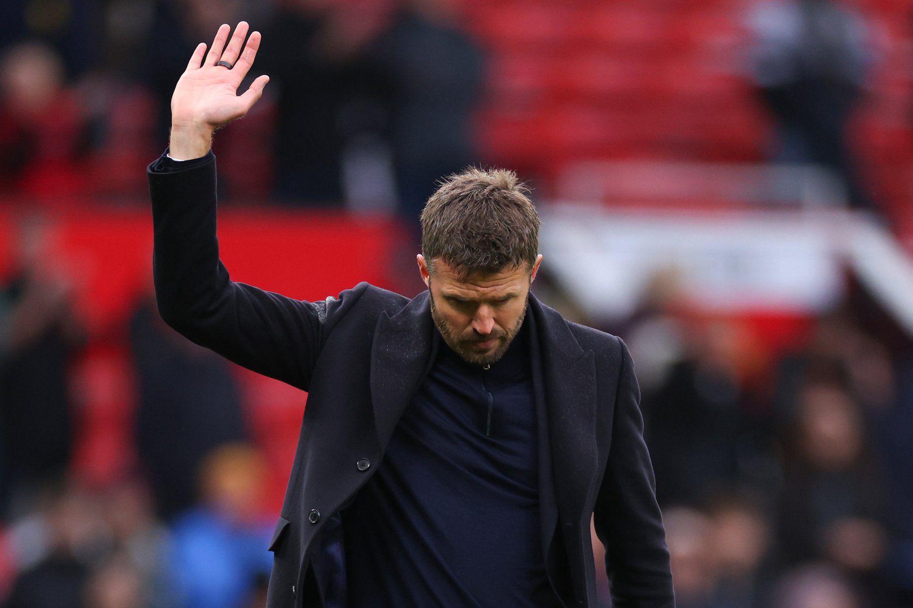Man United manager Michael Carrick waves at fans after defeat to Bournemouth