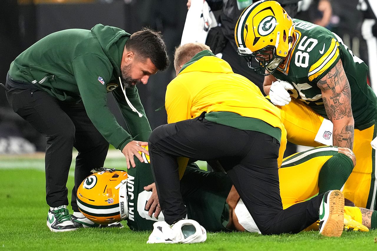 Christian Watson #9 of the Green Bay Packers is on the field with an injury during the second quarter against the Carolina Panthers at Lambeau Field on Oct. 29, 2026.Credit: Patrick McDermott/Getty