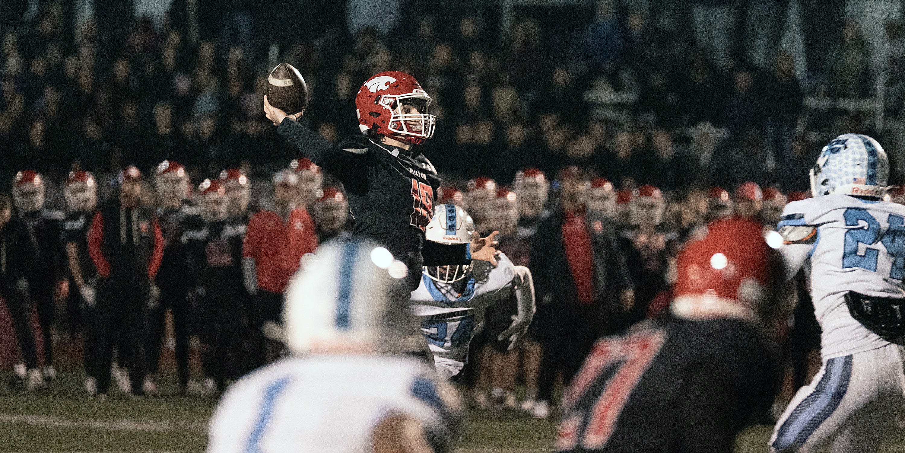 Milton senior quarterback Sean Lane throws against Franklin at Brooks Field in Milton, Oct. 23, 2026.