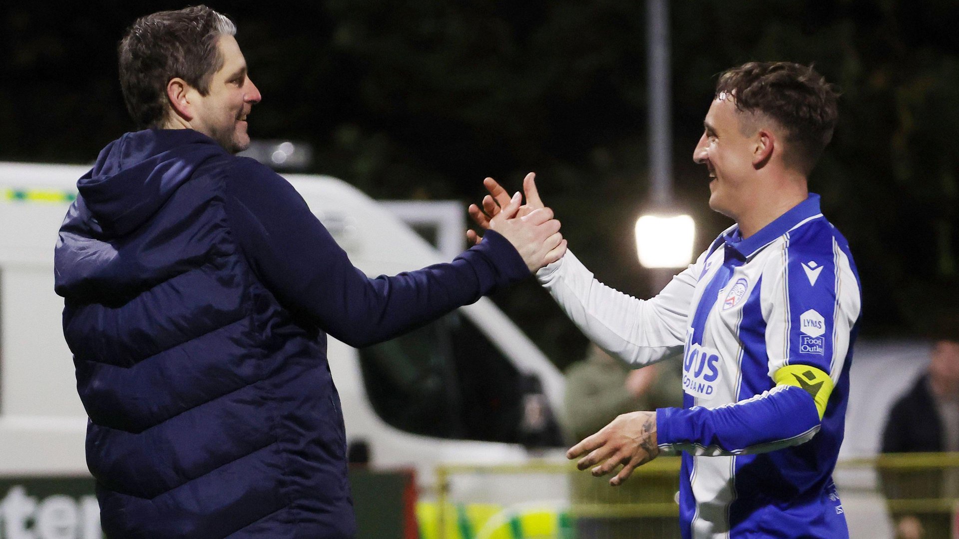 Joel Cooper celebrates with Ruaidhri Higgins